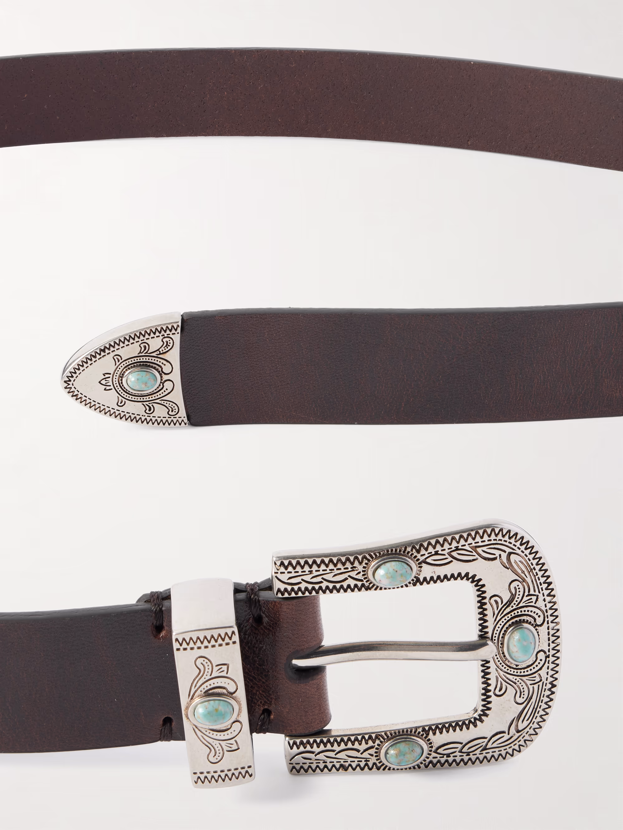 Artisan hardware — vintage brass buckles, wood closures, hand-sculpted details